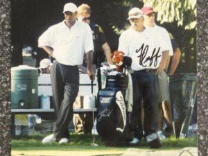 Tiger Woods and Fluff Cowan Autographed Photo